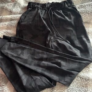 Black camo Lululemon joggers with drawstring waist